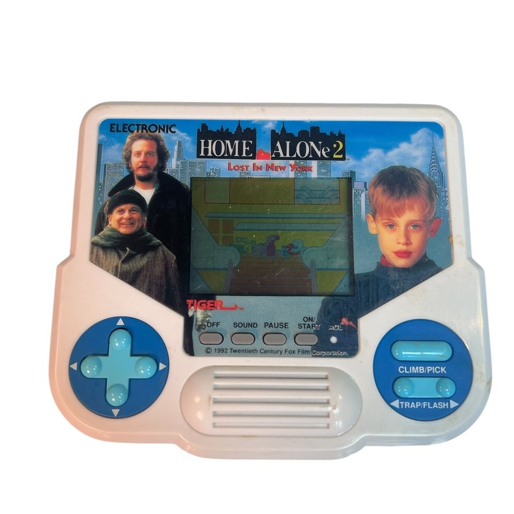 Vintage Electronic LED Home Alone 2 Handheld Game by Tiger. Tested and Working
